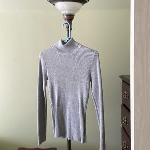 Never been worn sparkly gray turtleneck in size medium